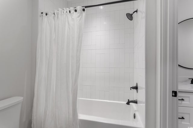 bathroom with toilet and shower / bath combo with shower curtain