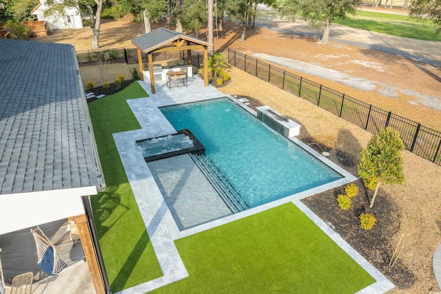 view of pool featuring a patio area, a fenced backyard, a lawn, and a gazebo