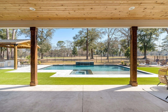 view of pool with a fenced in pool, a fenced backyard, and a lawn