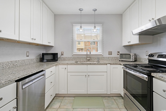 kitchen featuring a sink, under cabinet range hood, white cabinetry, appliances with stainless steel finishes, and a toaster