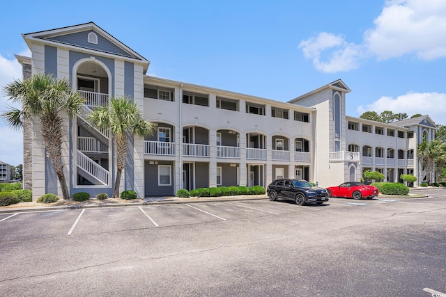 4503 W Harbour Ct Unit S-6, Little River, SC 29566 - view of apartment building / complex featuring uncovered parking