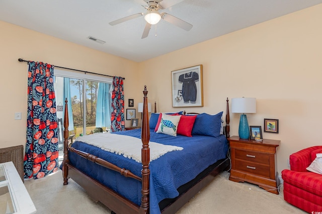 bedroom featuring carpet floors, access to outside, visible vents, and a ceiling fan