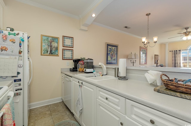 kitchen featuring white appliances, light tile patterned floors, visible vents, crown molding, and a sink