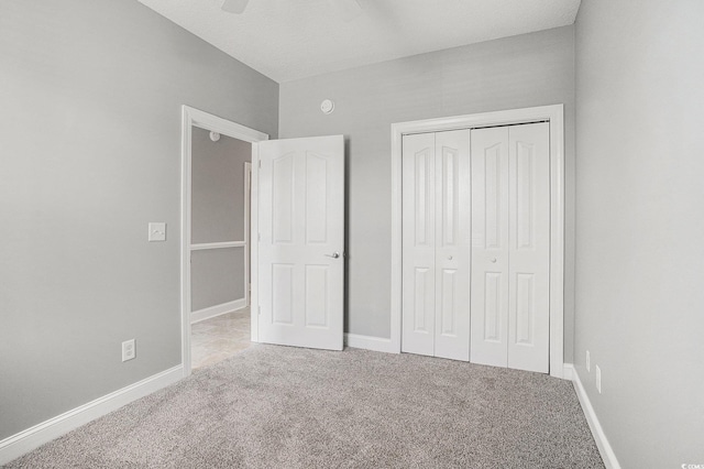 4503 W Harbour Ct Unit S-6, Little River, SC 29566 - unfurnished bedroom featuring light carpet, a closet, baseboards, and ceiling fan