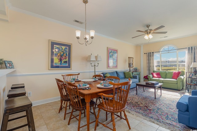 dining room with ornamental molding, visible vents, and light tile patterned floors