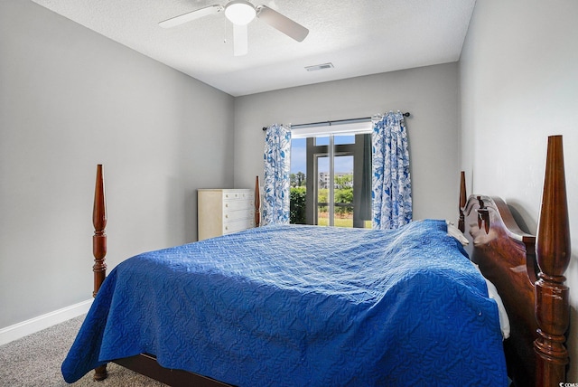 4503 W Harbour Ct Unit S-6, Little River, SC 29566 - carpeted bedroom featuring baseboards, a ceiling fan, and a textured ceiling
