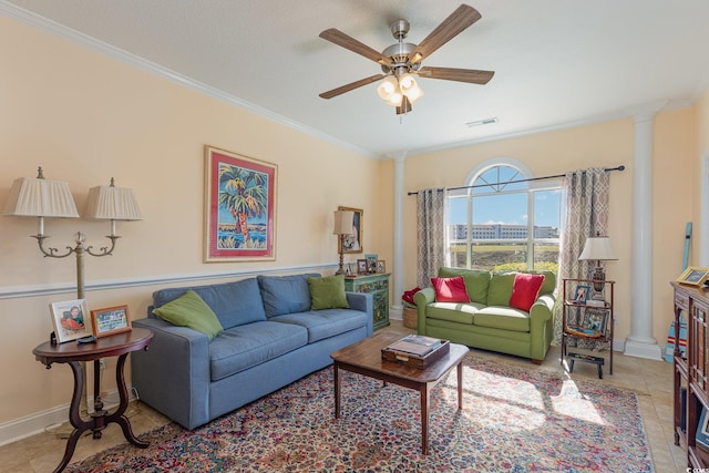 living room with decorative columns, visible vents, ceiling fan, and crown molding