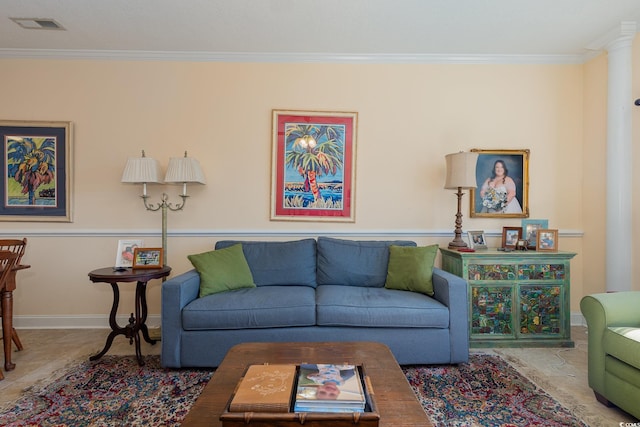 living room with visible vents, crown molding, and baseboards