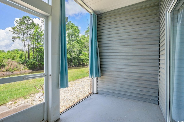 4503 W Harbour Ct Unit S-6, Little River, SC 29566 - doorway to outside with concrete floors