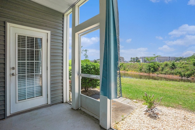 4503 W Harbour Ct Unit S-6, Little River, SC 29566 - doorway featuring unfinished concrete flooring
