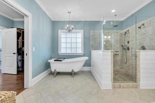 bathroom with a stall shower, ornamental molding, and a soaking tub