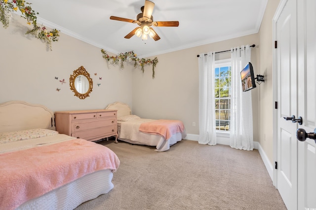 bedroom featuring baseboards, ceiling fan, light colored carpet, and crown molding