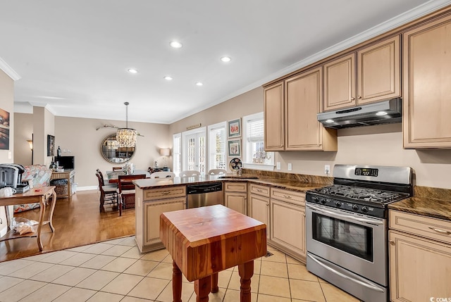 kitchen with light tile patterned floors, appliances with stainless steel finishes, ornamental molding, a peninsula, and under cabinet range hood