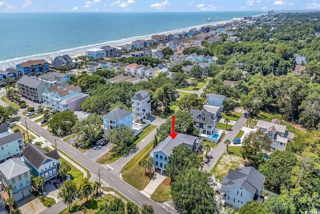 bird's eye view featuring a water view and a residential view