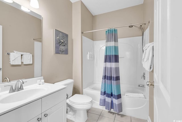 bathroom featuring tile patterned flooring, vanity, toilet, and shower / bath combo with shower curtain