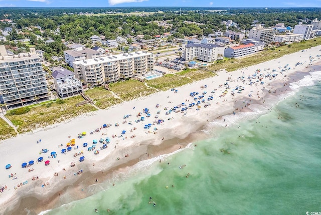 drone / aerial view with a view of the beach and a water view