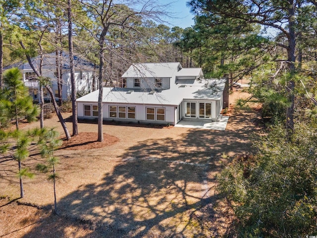 view of front of property featuring a patio