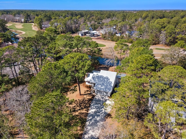 aerial view featuring a forest view