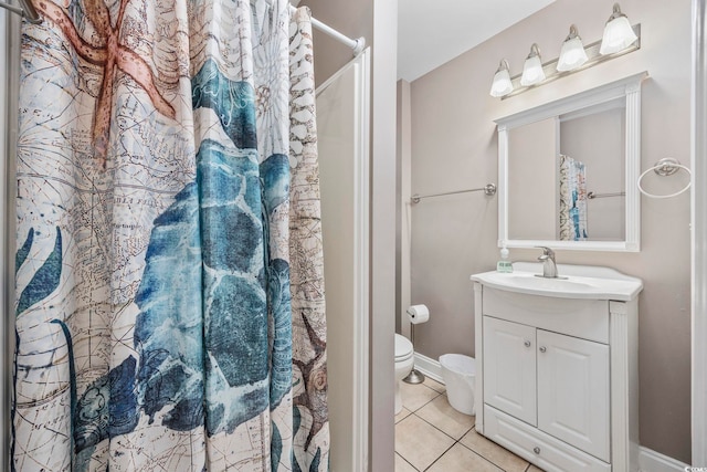 bathroom featuring vanity, curtained shower, tile patterned flooring, and toilet