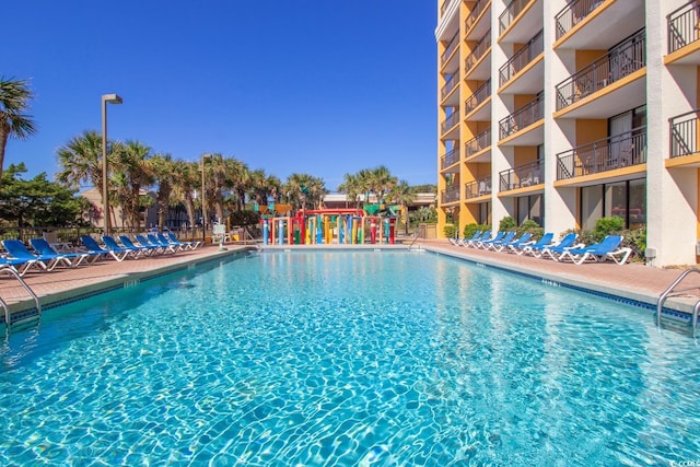 pool featuring a patio area