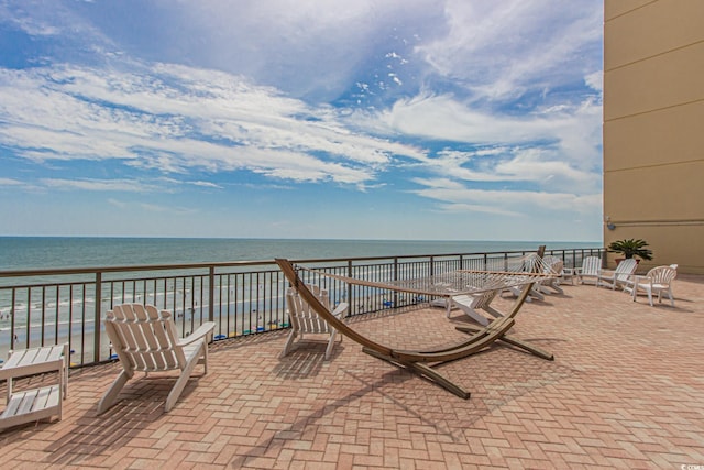 view of patio / terrace with a water view