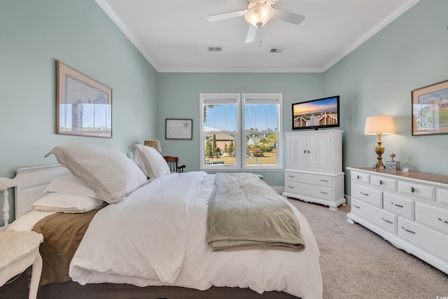 bedroom featuring light carpet, ceiling fan, ornamental molding, and visible vents