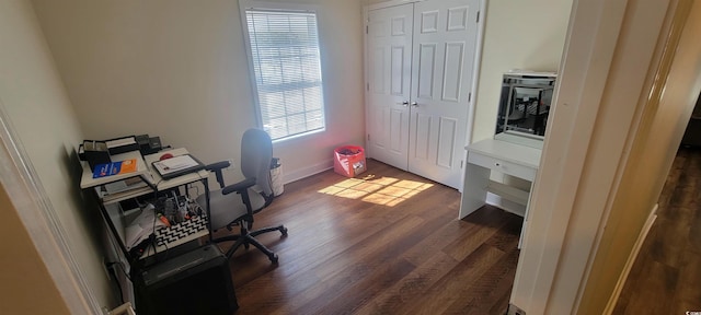 office featuring dark wood finished floors and baseboards