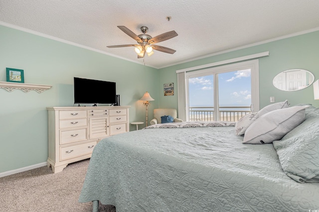 bedroom featuring light carpet, access to outside, and ornamental molding