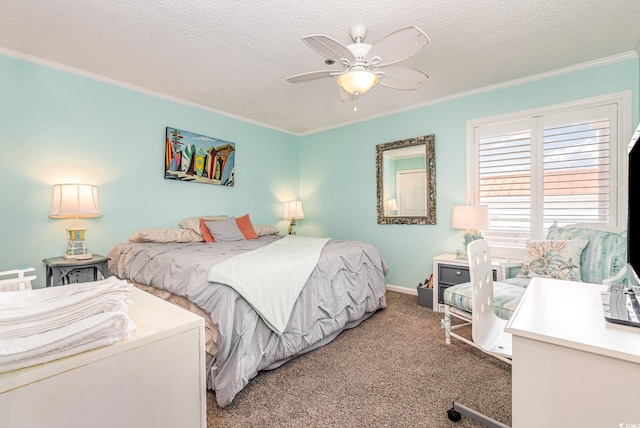 carpeted bedroom featuring baseboards, ornamental molding, ceiling fan, and a textured ceiling