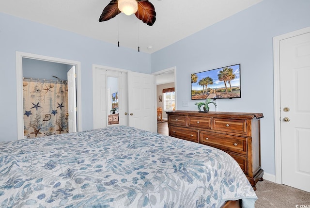 carpeted bedroom with ceiling fan and connected bathroom