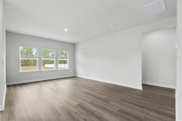 4295 Falls Oaks St, Myrtle Beach, SC 29579 - spare room with dark wood finished floors, baseboards, visible vents, and recessed lighting