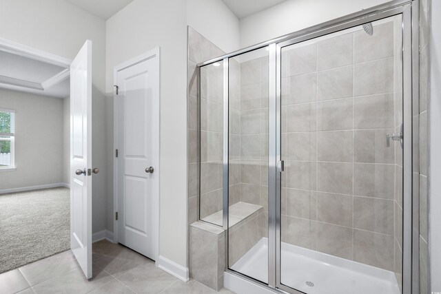 4295 Falls Oaks St, Myrtle Beach, SC 29579 - full bathroom featuring tile patterned flooring, baseboards, and a shower stall