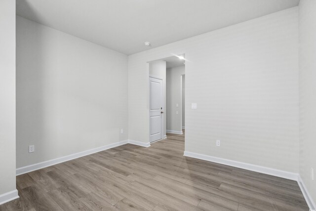 4295 Falls Oaks St, Myrtle Beach, SC 29579 - empty room featuring baseboards and wood finished floors
