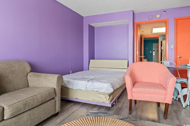 201 S Ocean Blvd Unit 217, Myrtle Beach, SC 29577 - bedroom featuring wood finished floors