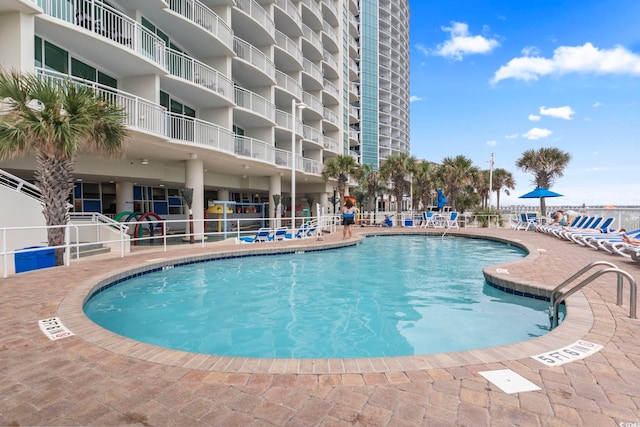 201 S Ocean Blvd Unit 217, Myrtle Beach, SC 29577 - community pool featuring a patio