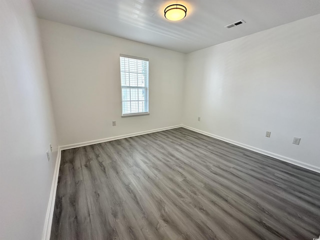 5000 Windsor Green Way Unit 204, Myrtle Beach, SC 29579 - empty room with dark wood-type flooring and baseboards