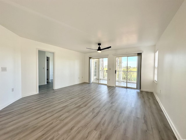5000 Windsor Green Way Unit 204, Myrtle Beach, SC 29579 - spare room with wood finished floors, ceiling fan, and baseboards
