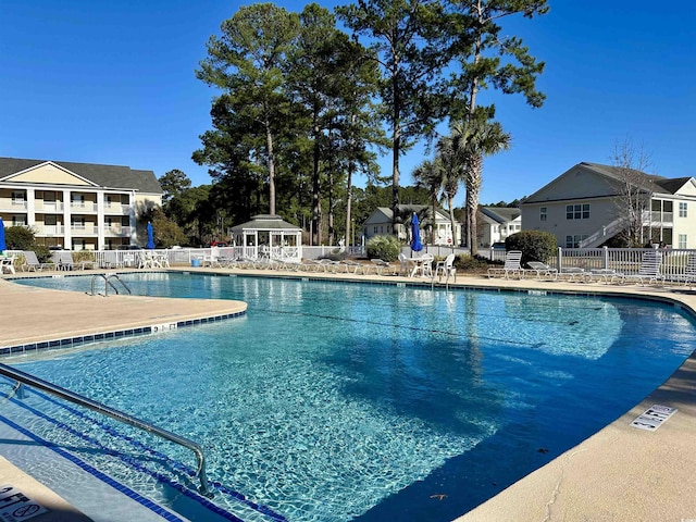 5000 Windsor Green Way Unit 204, Myrtle Beach, SC 29579 - community pool featuring fence and a residential view