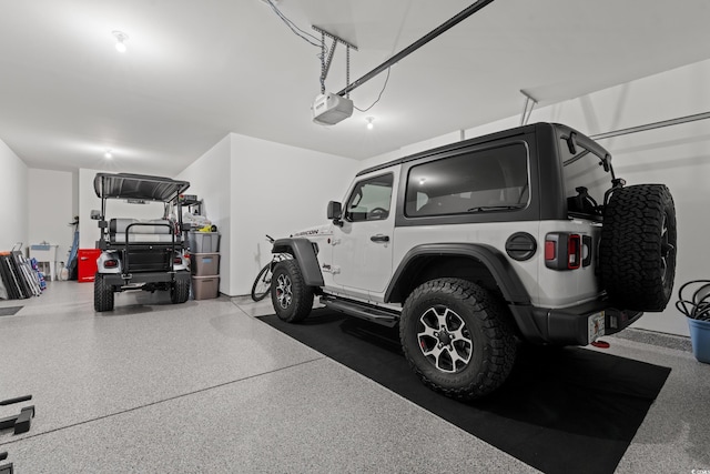 garage featuring a garage door opener