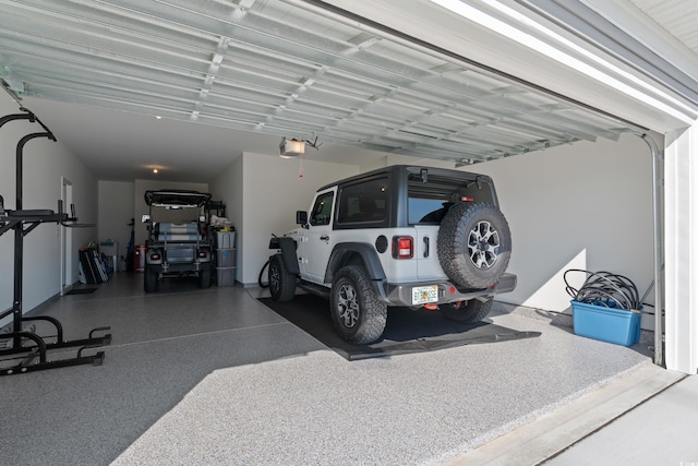 garage featuring a garage door opener