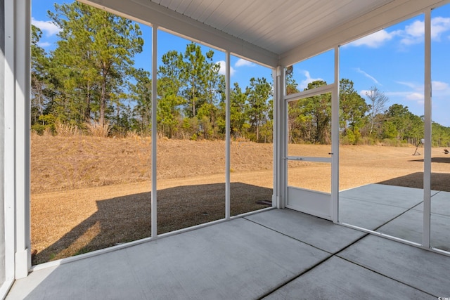 unfurnished sunroom with a wealth of natural light