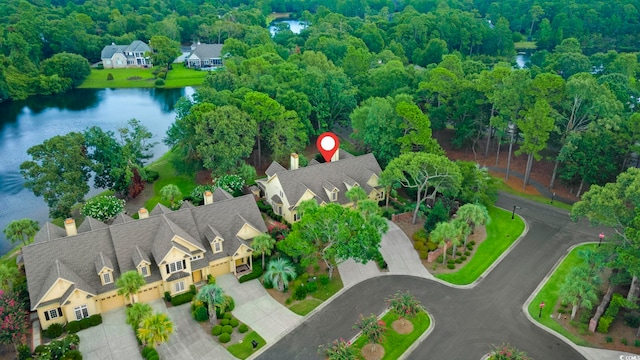 bird's eye view with a residential view and a water view