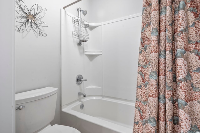 full bath with shower / bath combo and toilet