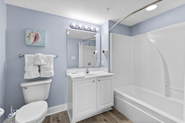 2007 S Ocean Blvd Unit 2006, Myrtle Beach, SC 29577 - bathroom with wood finished floors, vanity, a textured ceiling, and shower / bath combination