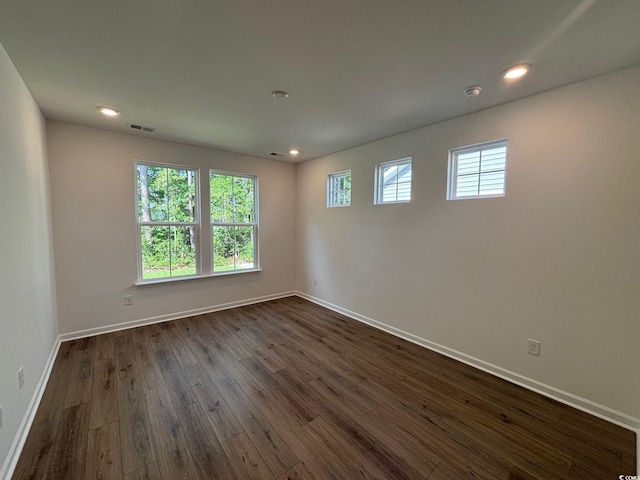 444 Sun Colony Blvd, Longs, SC 29568 - empty room featuring dark wood finished floors and recessed lighting