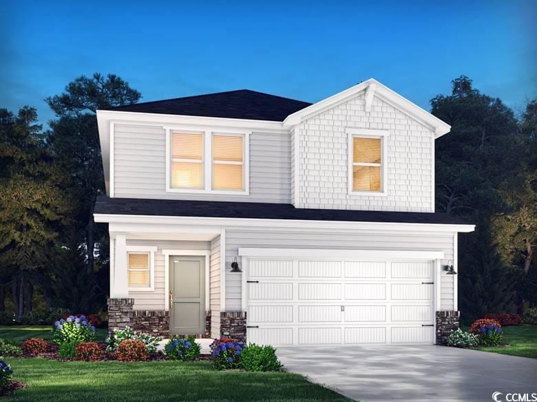 view of front of property with stone siding, an attached garage, and driveway