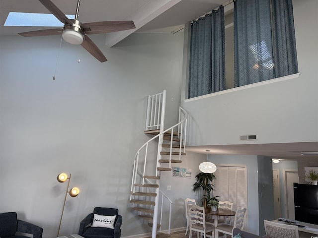 1890 Colony Dr Unit 17T, Surfside Beach, SC 29575 - stairway featuring visible vents, ceiling fan, and a high ceiling