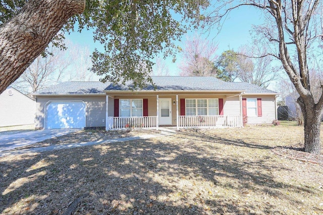 ranch-style house with covered porch, driveway, and an attached garage