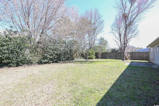 view of yard with fence