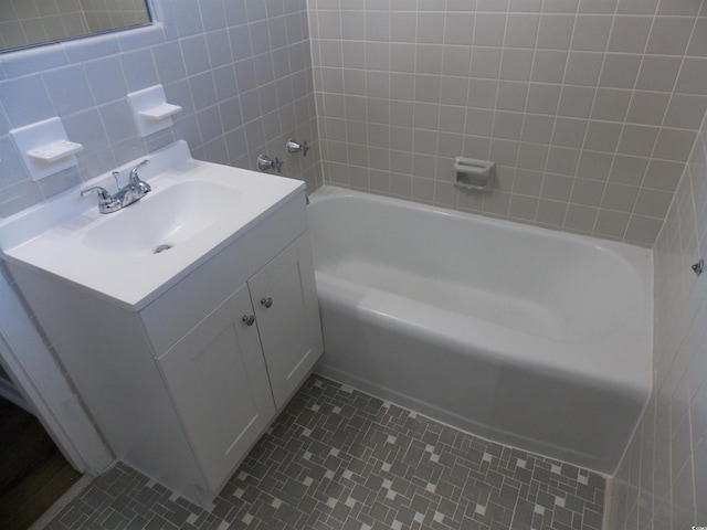 full bathroom with vanity and tile patterned floors